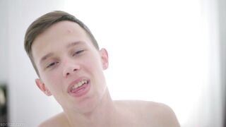 Sweet young teen boy oils up his big boner